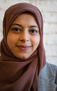 Headshot portrait of Aliya Ghare